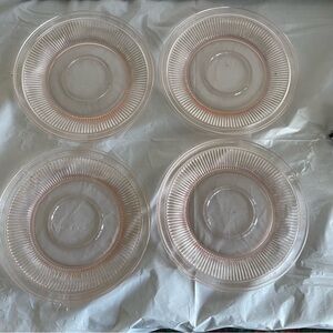 Vintage pink depression glass with raised center rim